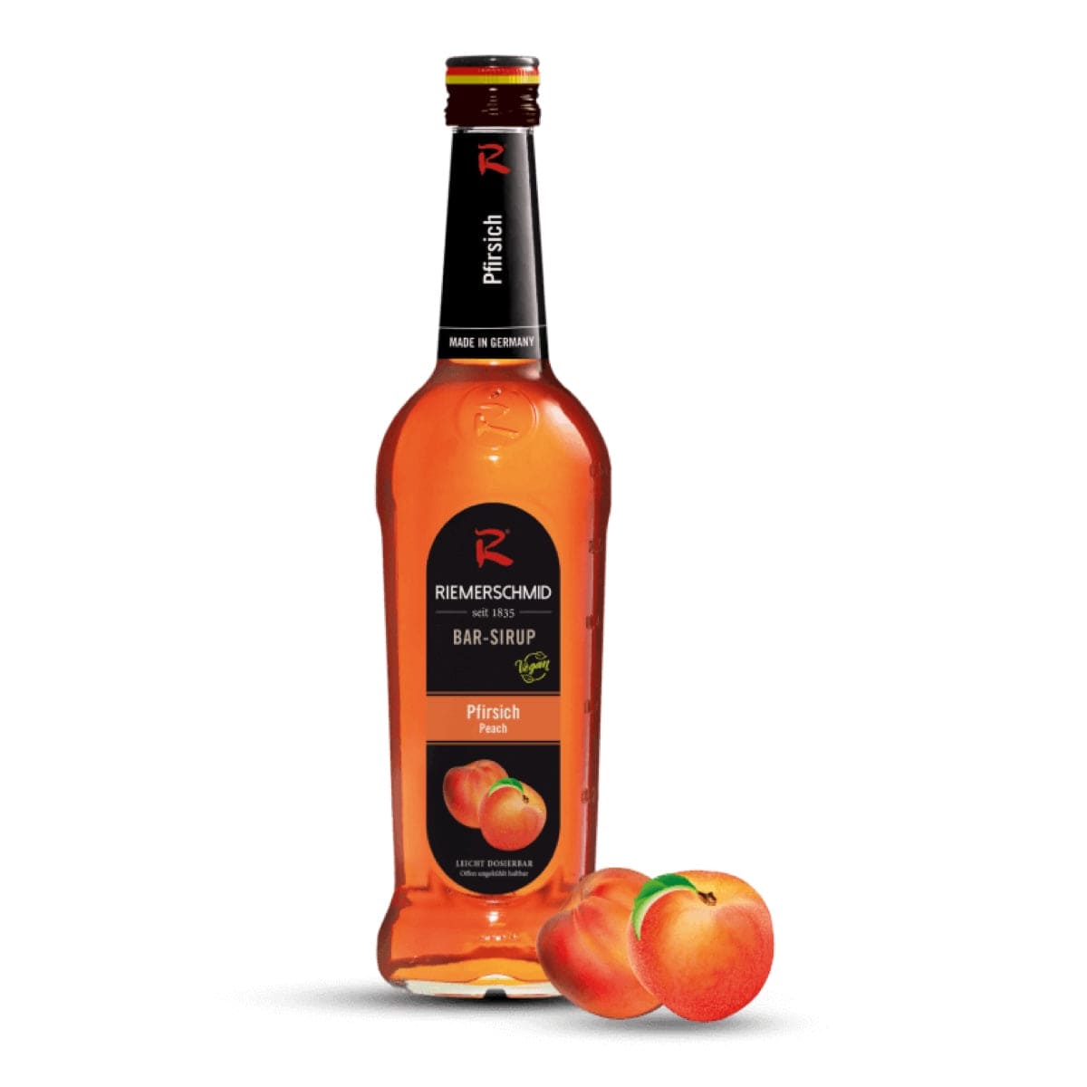 Riemerschmid Fersken Sirup – frugtagtig og aromatisk sirup med smag af solmodne ferskner. Perfekt til mocktails, iste og desserter.